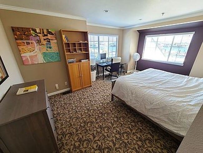 Building Photo - Fabulous Waterfront Condo with Private Boa...