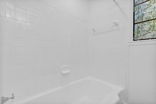 Building Photo - Bright & Updated 2BR Top Unit Duplex | White Kitchen & Stainless Appliances in Saint Petersburg