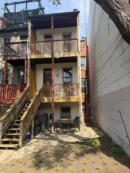 Rear of home. Note double porches. - 1336 Kenyon St NW