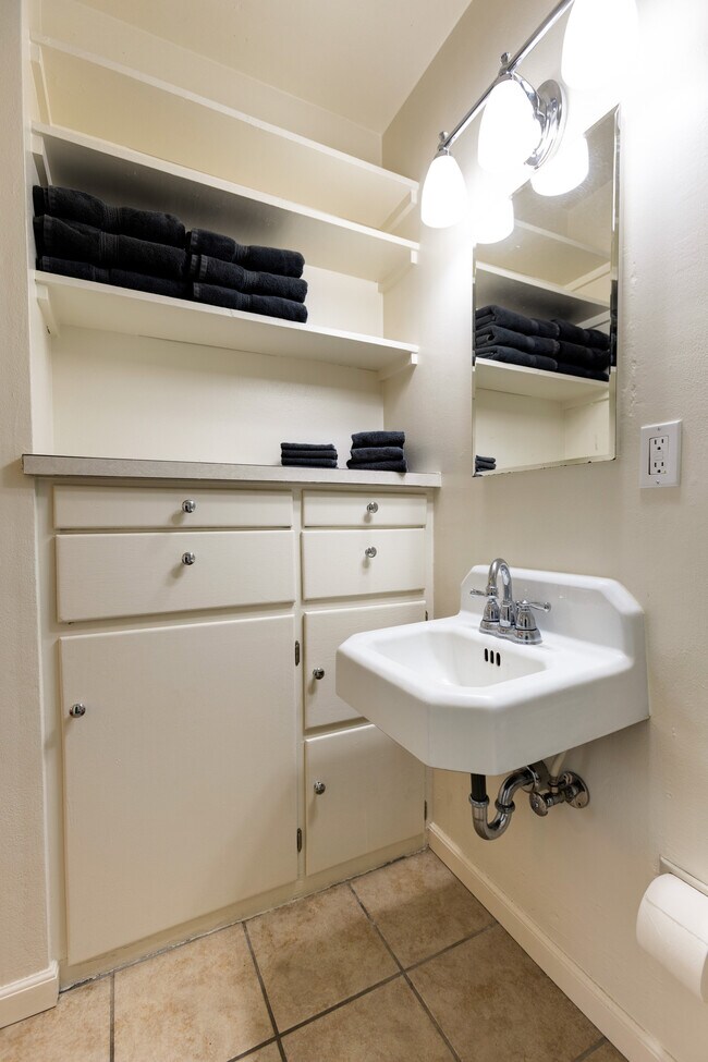 Plenty of storage in the bathroom - 311 W 29th St.