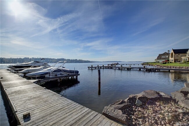 Building Photo - 8479 NE Woodland Cove Dr