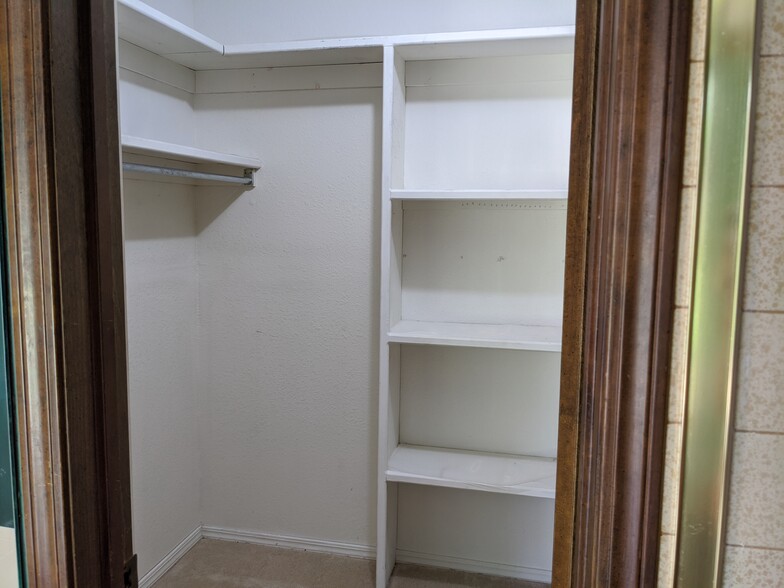 walk-in closet in master bathroom - 205 N Easy St