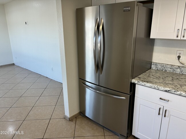 Building Photo - 8819 W Roma Ave