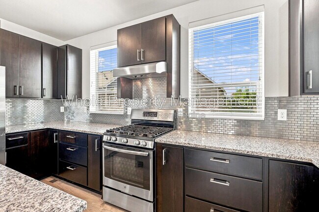Building Photo - 9004 E 49th Pl