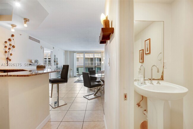Building Photo - 6917 Collins Ave