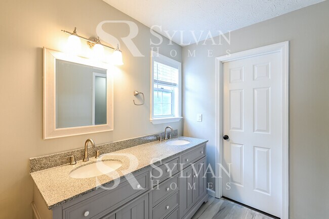 Building Photo - Prepare to fall in love with this 4 bedroom, 2.5 bathroom home