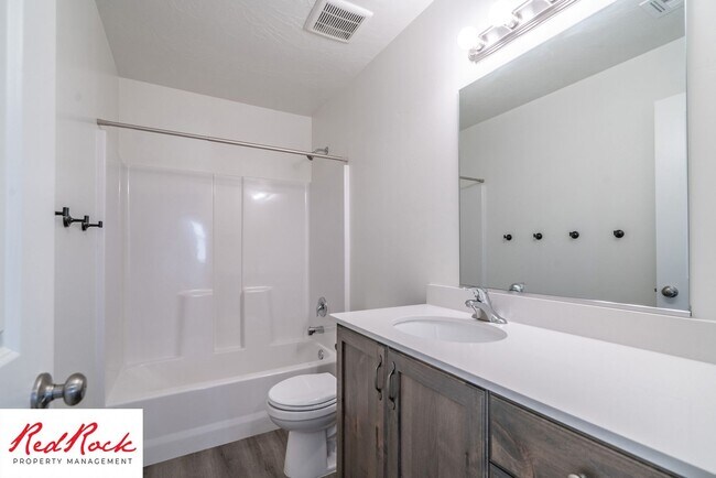 Building Photo - Adorable Stand Alone 4 Bedroom Corner Unit with Fully Fenced Backyard. Small Dogs Welcome.