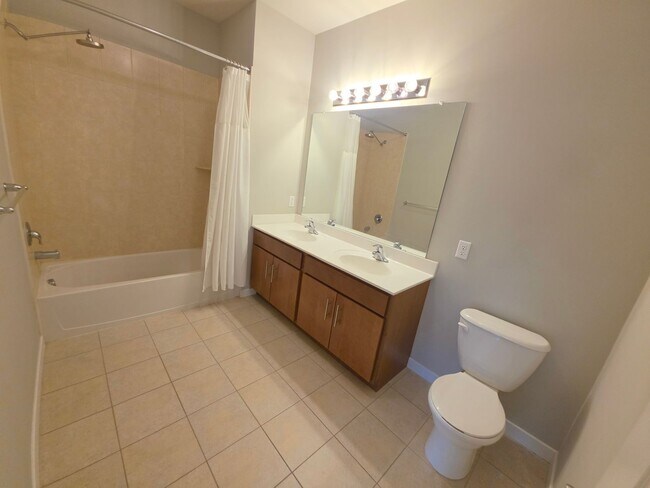 Building Photo - Beautiful 2nd floor (with elevator services) condominium: 2-bed, 2-bath, beautiful kitchen, bonus...