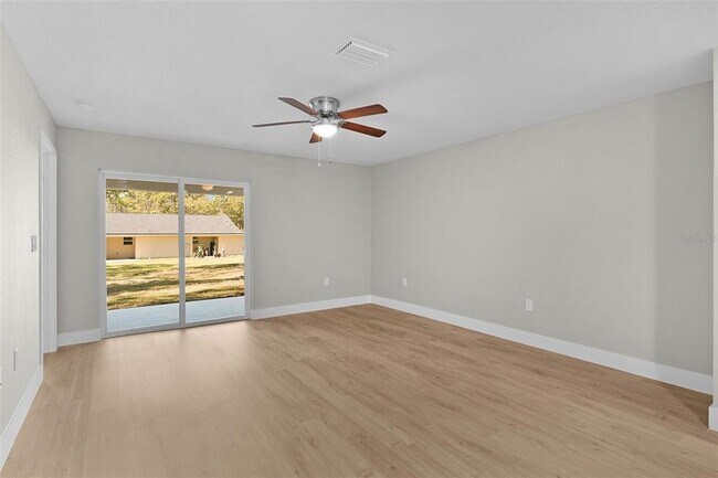 Building Photo - 9170 N Travis Dr