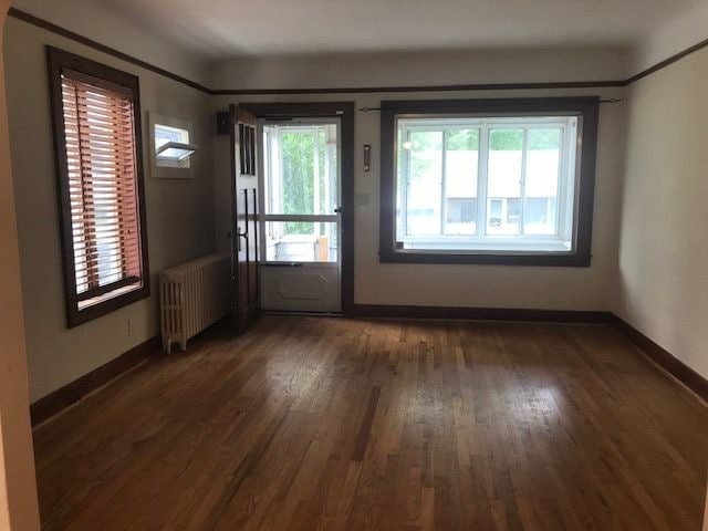 Living area looking towards porch - 2953 Moss St
