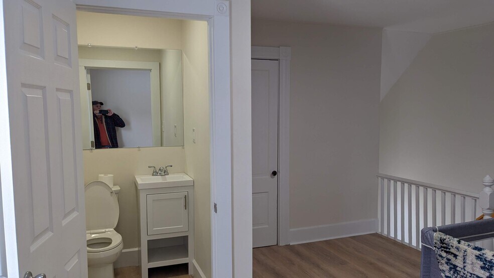 2nd floor 1/2 bath and common room - 293 Madison St
