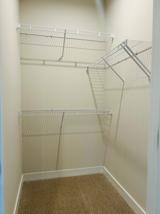 Building Photo - New Construction • 4 BR • 2 Full / 2 Half BA • End Unit Townhome in Village Town – Fayetteville’s...