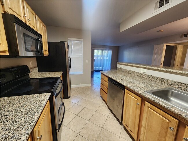 Building Photo - 5055 W Hacienda Ave