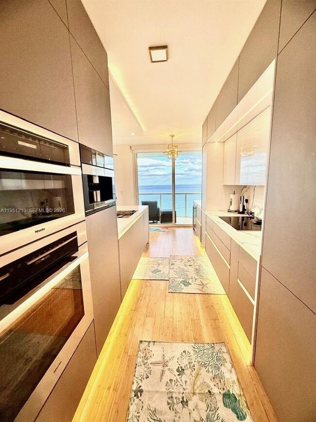 Building Photo - 6365 Collins Ave