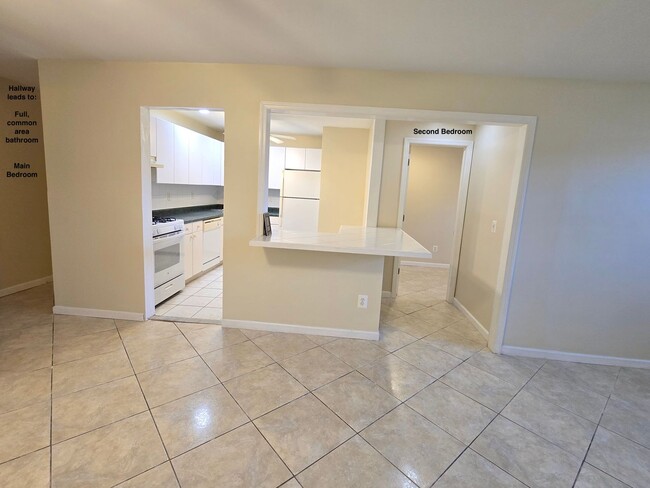 Building Photo - Updated and spacious garden (ground) floor apartment with 2-bedrooms & 1 full bathroom