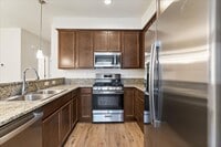 Building Photo - The Sierra - Beautiful 2 Bedroom Luxury Townhome with Loft, 2.5 Bath and Full 2 Car Garage