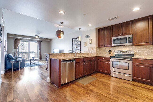 Building Photo - GORGEOUS FURNISHED CONDOMINIUM WITH GREAT ...