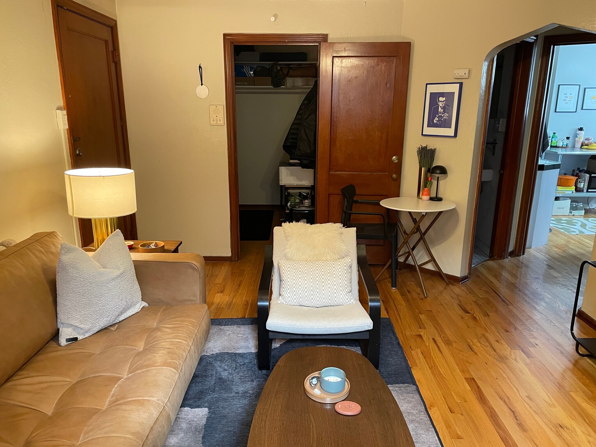 Staged Living Room and Image of Extra Room - 1605 St Paul St