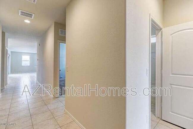 Building Photo - 37748 W Bello Ln