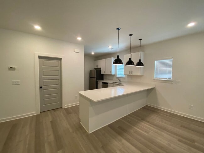 Building Photo - NEW CONSTRUCTION 5 BEDROOM PRE-LEASING FOR...