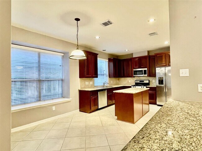 Building Photo - 5527 Custard Apple Trail