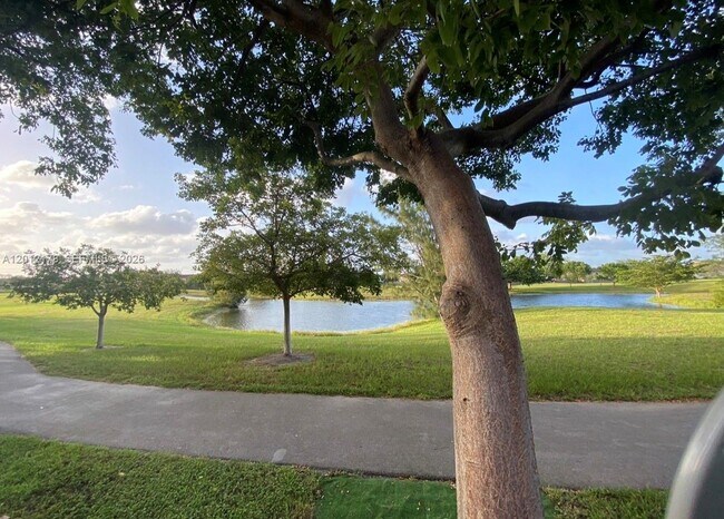 Building Photo - 6995 NW 173rd Dr