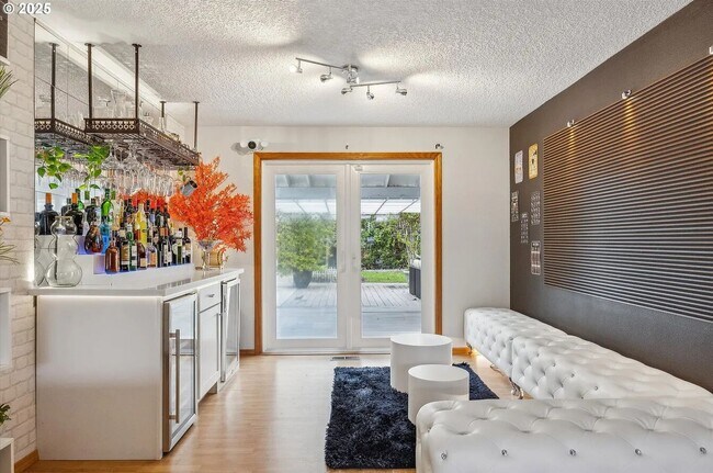 Building Photo - Modern Charm Meets Comfort – Spacious 3-Be...