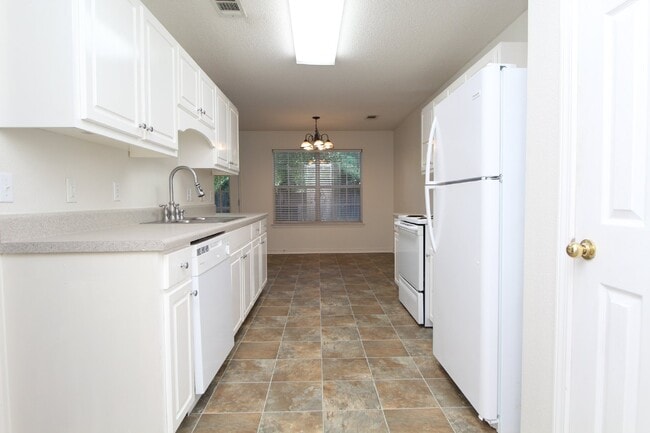 Building Photo - Modern 3-Bedroom Two-Story Home Featuring 2-Car Garage, Open Great Room with Fireplace, Private P...