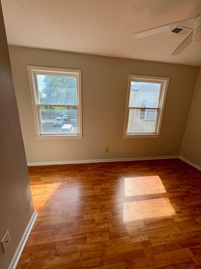 Building Photo - Charming End Unit Two Bedroom Townhome on ...