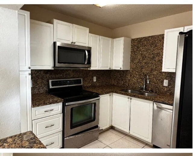 Building Photo - 10859 NW 45th St