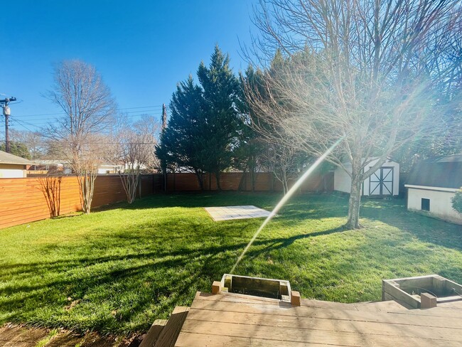 Large fenced back yard with two sheds for storage - 2339 Kilborne Dr