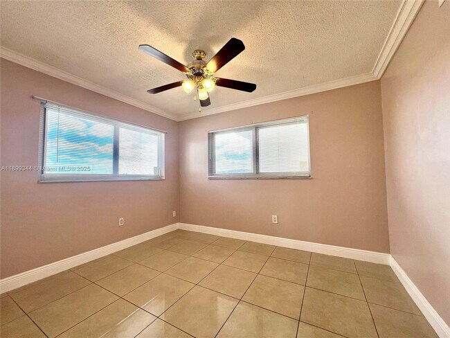 Building Photo - 9915 W Okeechobee Rd