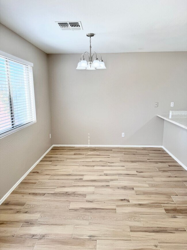 Building Photo - Remodeled 5 Bedroom/3 Bath Home. Upgraded Flooring & Kitchen!