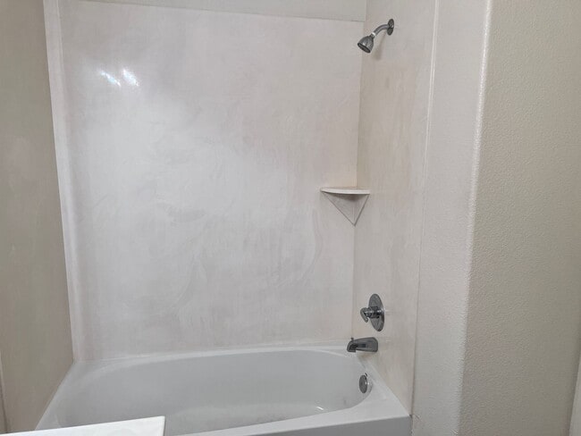 Building Photo - Wonderful 3 Br condo in gated community with the major appliances and 1 car garage.