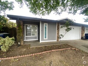 Building Photo - Spacious Foothill Farms Duplex