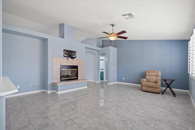Building Photo - Multiple Living Areas 4-Bedroom Retreat with Vaulted Ceilings & No Carpet