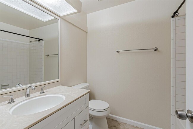 Building Photo - Stylish End-Unit Condo l Private Patio l Community Pool