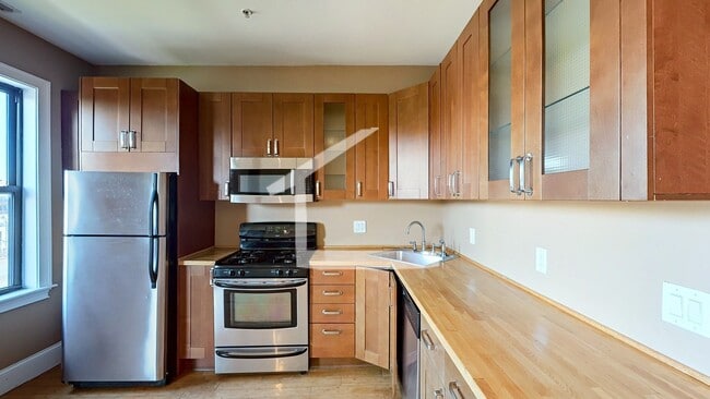 Building Photo - Private Roof Deck, Central Heat/AC, In-Unit Washer and Dryer, Pets Friendly Unit, Luxury Finishes
