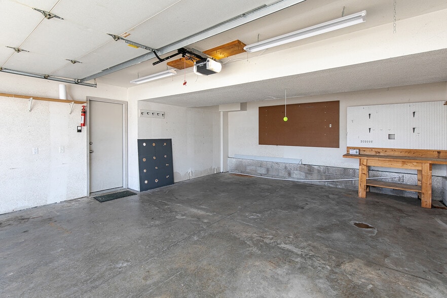 two car attached garage - 1101 SE Chaparal Dr