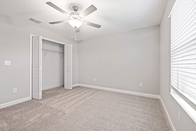 Building Photo - "Spacious 4-Bedroom Lutz Home gated commun...