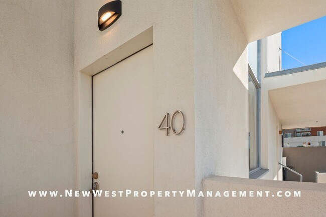 Building Photo - Views, Views, Views! Stunning Top-Floor Little Italy 2-bedroom Loft at The Waterfront!