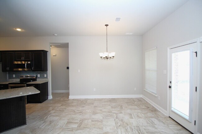 Building Photo - Spacious 3-Bedroom, 2-Bath Brick Home in N...