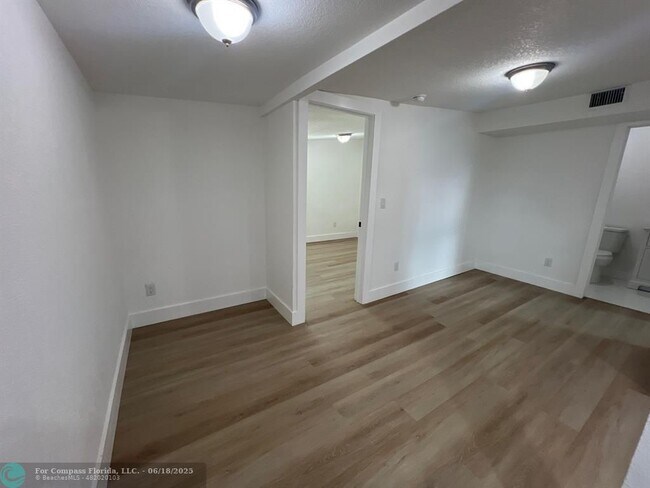 Building Photo - 10540 NW 28th Ave