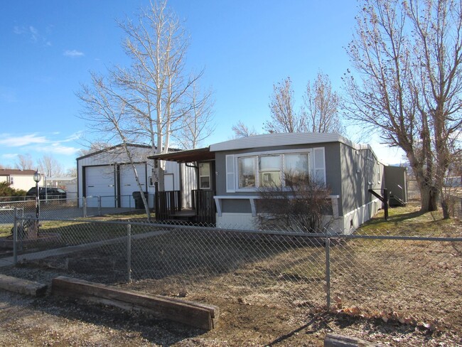 Building Photo - Updated Older Mobile Home w/ Quonset Garag...