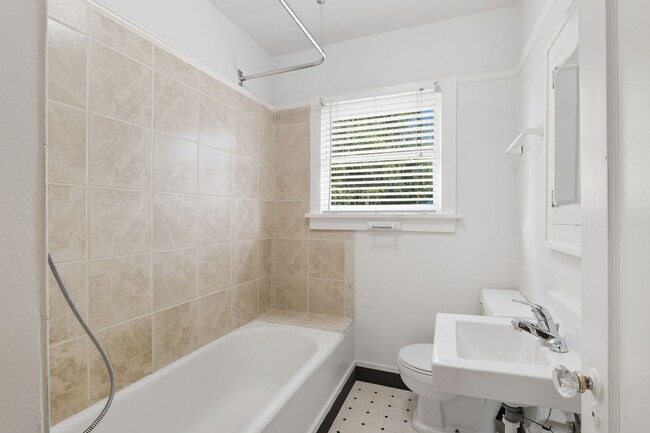 Building Photo - Charming Bungalow with Spacious Loft Suite and Large Backyard