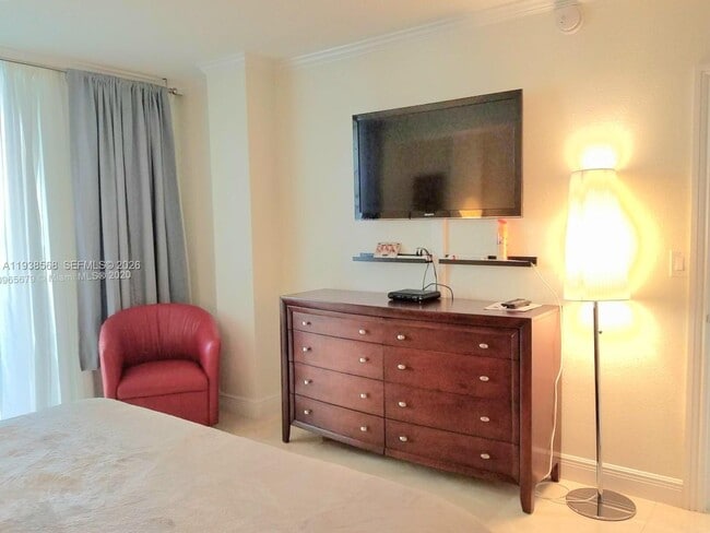 Building Photo - 10275 Collins Ave