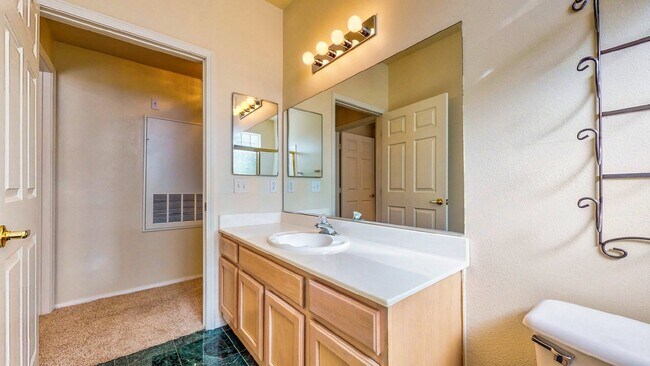 Building Photo - Experience Las Vegas in style and comfort with this beautiful first-floor 3-bedroom condo