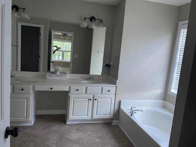 Building Photo - Welcome to this stunning 4-bedroom, 3-bath...