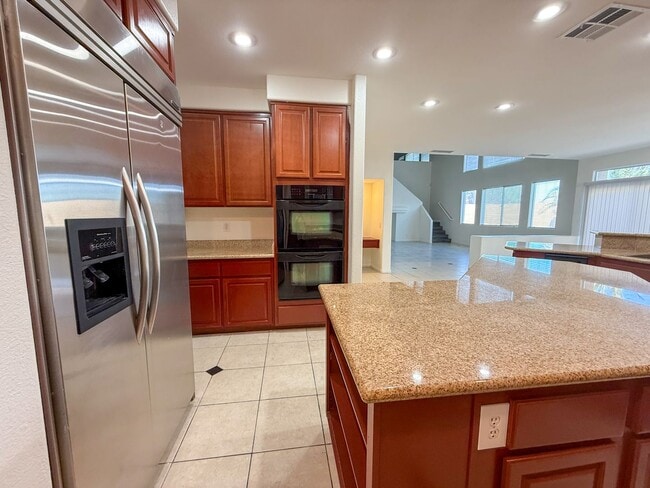 Building Photo - SPACIOUS HOME IN GATED COMMUNITY WITH POOL, RV PARKING & 4-CAR GARAGE!