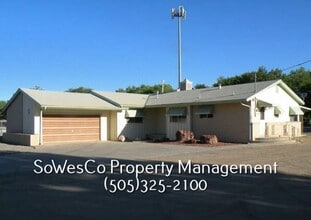 Building Photo - Three Bedroom Two Bath Home with Two Car Garage